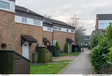 Houses on Broad Dean, Milton Keynes, showing neat front spaces and bin storage which meet the access footpath.