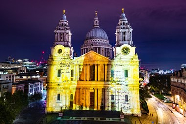 The photo has captured a moment in the projections when pages of the St Paul's Watch log book are being turned through showing the hand writing of watch members who updated it.