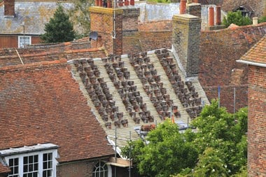 Old cottage roof during replacement work.