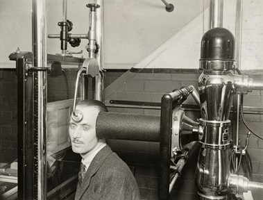 X-ray film being taken of a foreign body in a man's eye