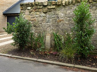 An 18th-century milestone and troop mustering point on the Military Road from Newcastle to Carlisle.