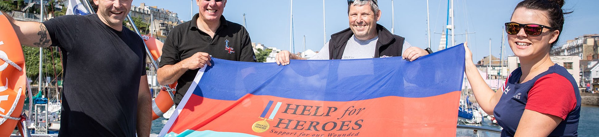 Dan Andy Matthew Sacha with Flag