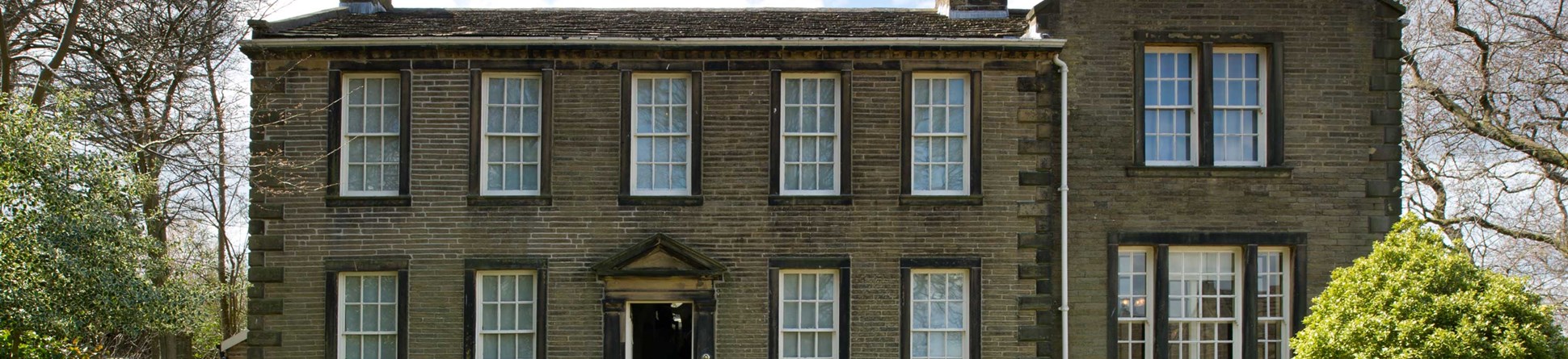 Image of the Brontë Parsonage in Haworth which was home to Patrick Brontë and his three literary daughters Charlotte, Emily and Anne from 1820 onwards.