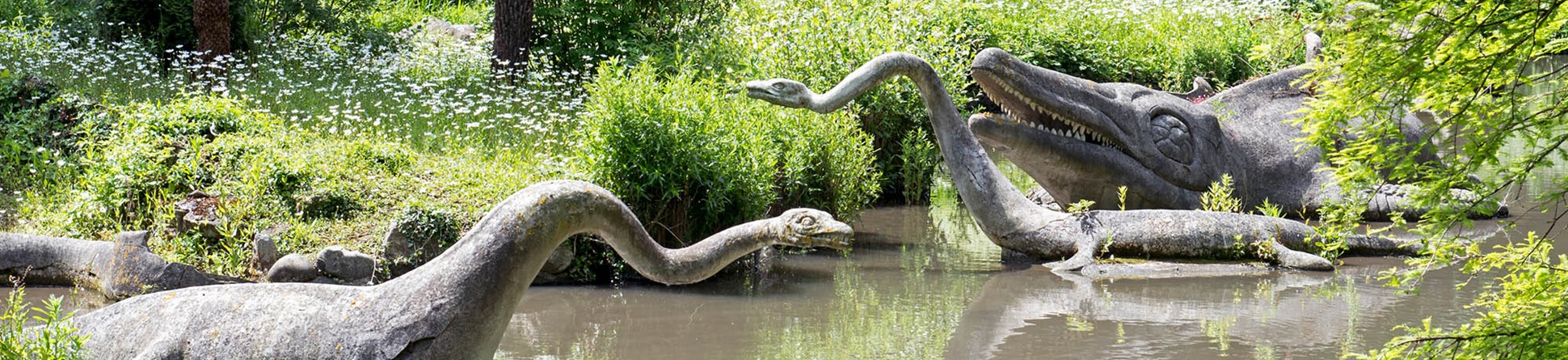 The dinosaur sculptures in the 'At Risk' Crystal Palace Park.