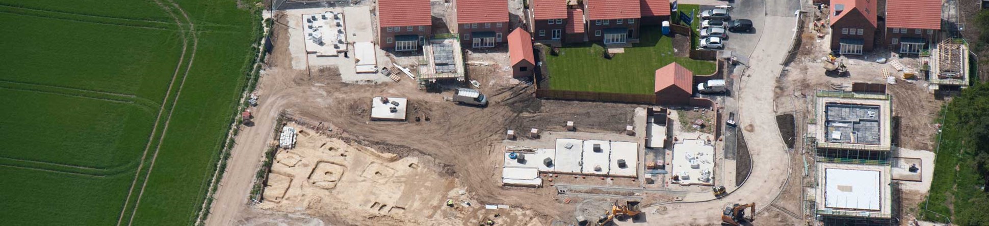 An aerial view of excavations at Pocklington in the East Riding of Yorkshire showing a number of small enclosures containing graves