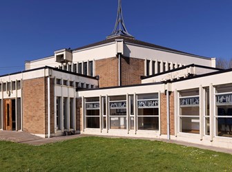 General view of exterior to hexagonal plan with lattice spire, view from east.